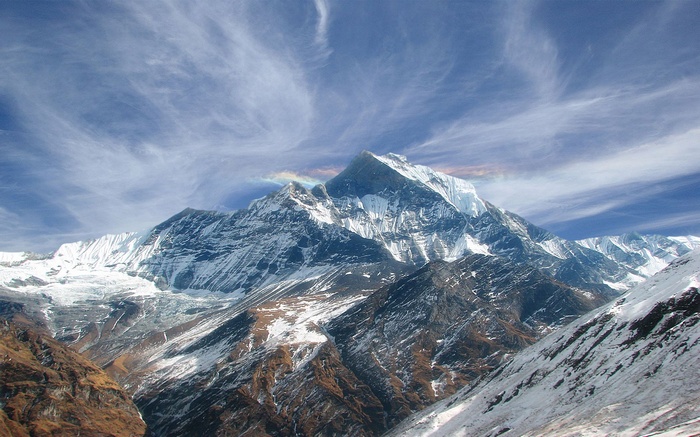 Annapurna mountain range with rainbow halo