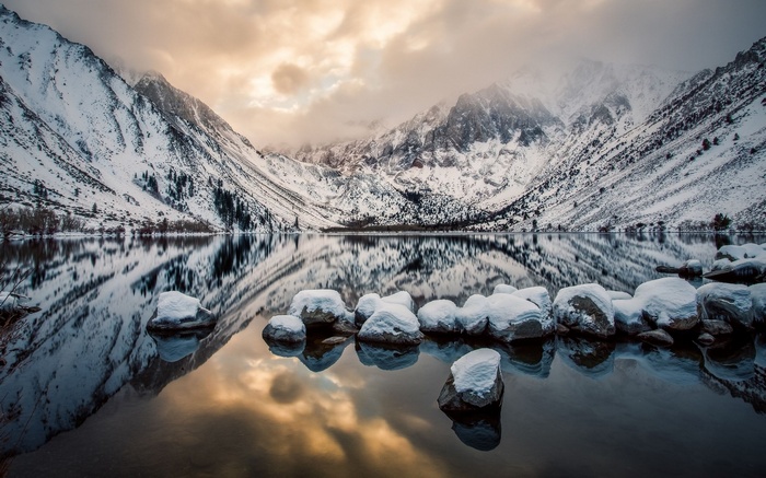 Snowy Mountains Reflecting in a Calm Lake