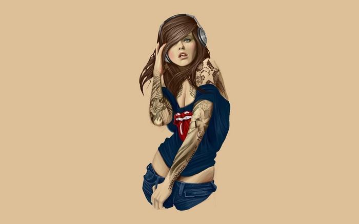 Tattooed girl with headphones listening to music