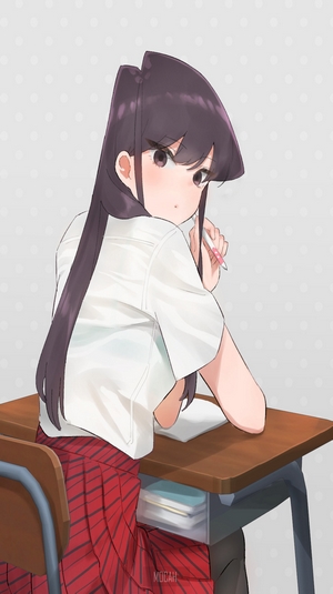 Komi Shouko from Komi Can't Communicate sitting at a desk