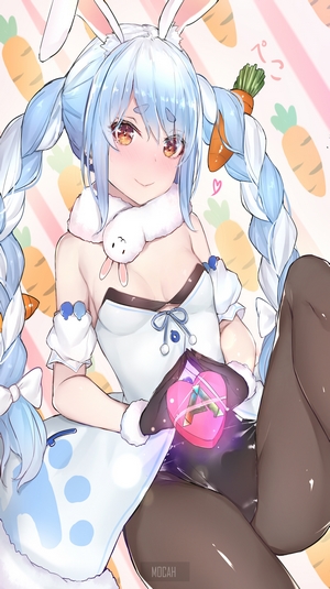 Usada Pekora from Hololive holding a heart-shaped box