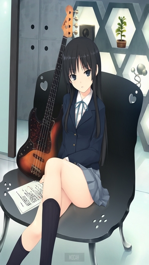 Mio Akiyama from K-ON! with a bass guitar