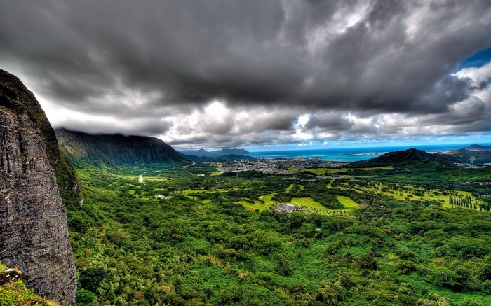 Dramatic mountain valley overlooking a coastal town