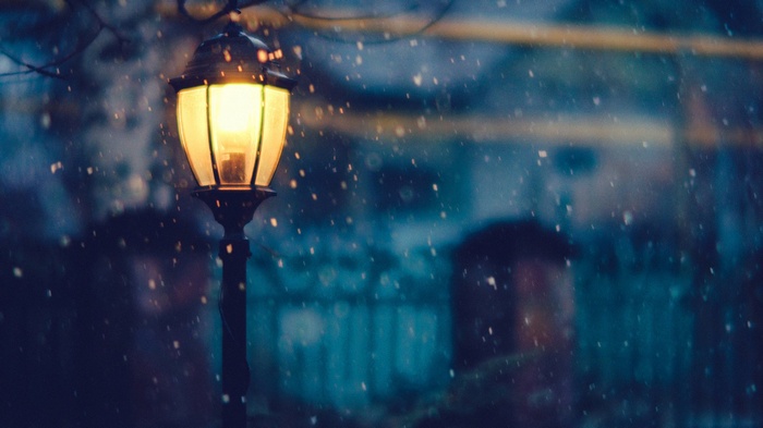 Street lamp in the snow at night