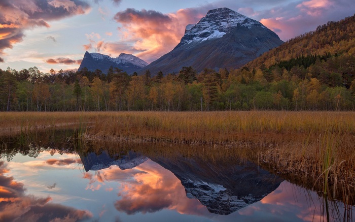 Mountain reflection in a lake at sunset