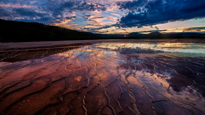 Sunset reflection on a geothermal pool
