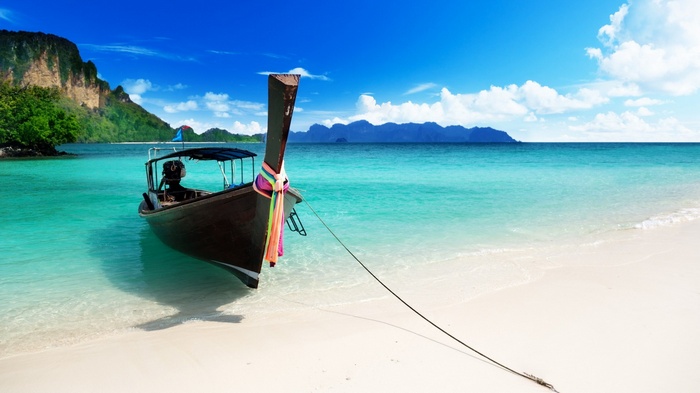 Longtail boat on a tropical beach