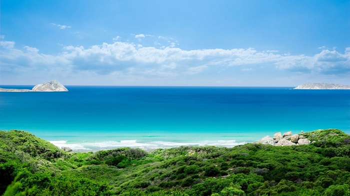 Ocean view with islands and green hills