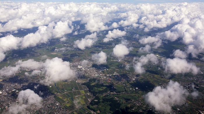 Aerial view of clouds over a landscape
