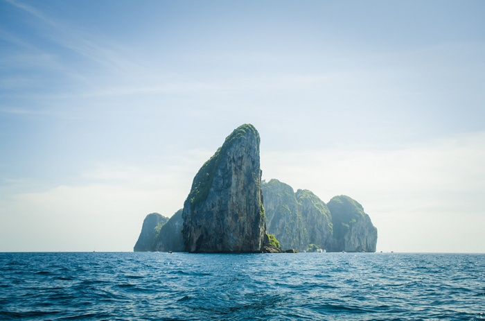 Rocky islands in the ocean under a clear sky