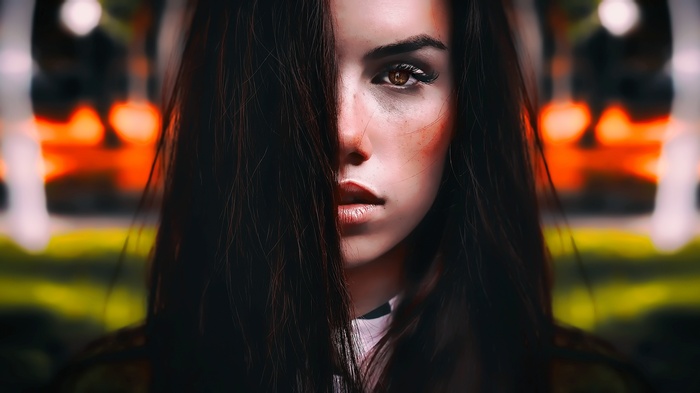 Woman with hair covering half her face