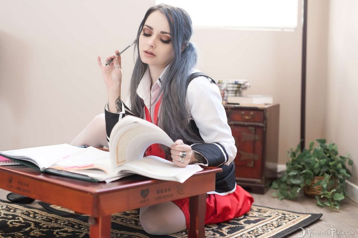 Genevieve studying with books
