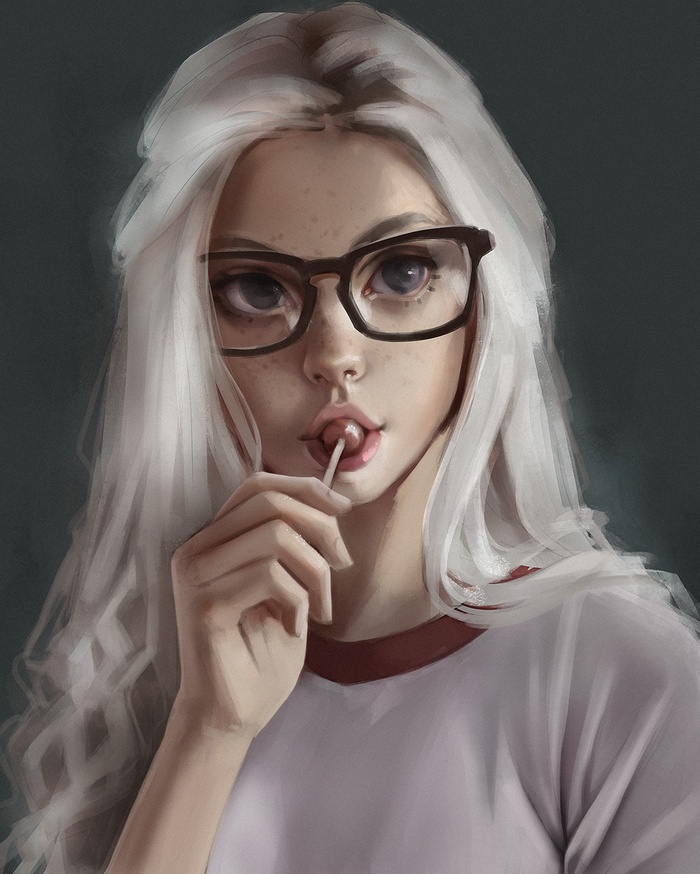 Woman with blonde hair and glasses eating a lollipop