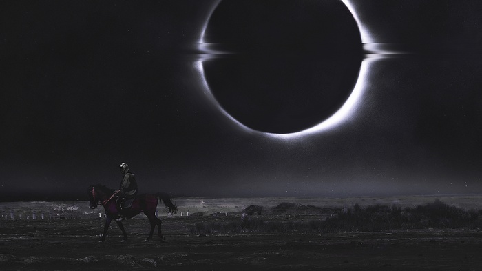 Man on horse during solar eclipse