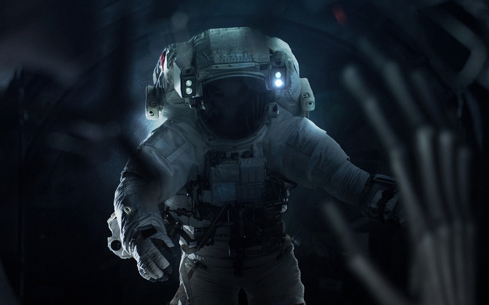 Astronaut in a dark space environment