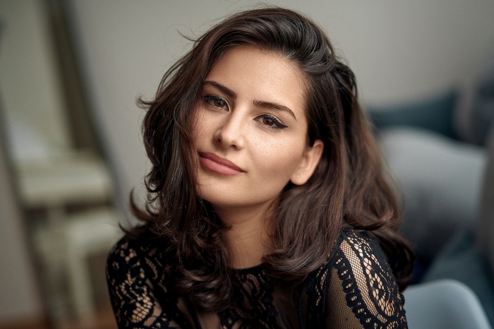 Woman with dark hair and eyeliner