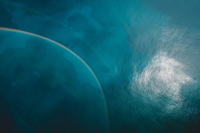 Aerial view of a rainbow over the Caribbean Sea