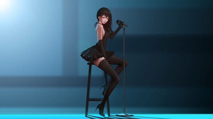 Girl in black dress singing on stage