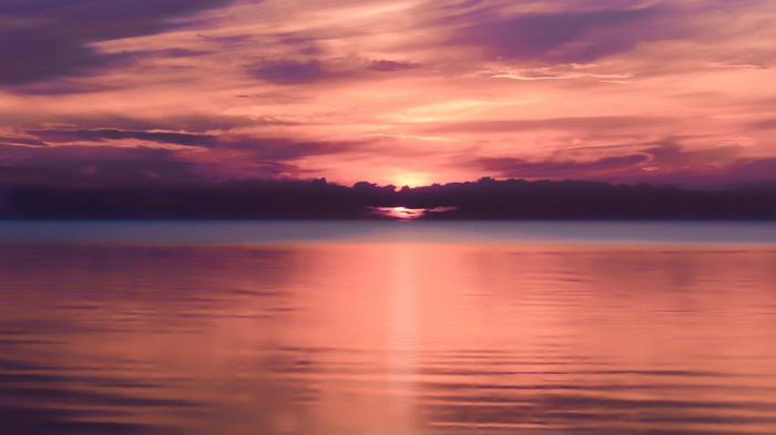 Sunset over the sea with clouds