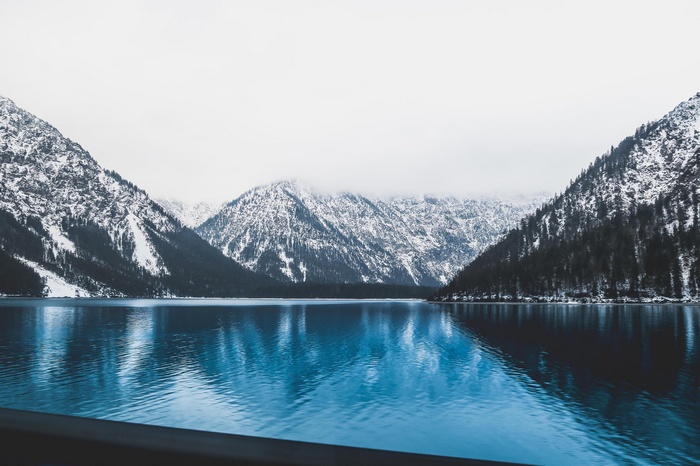 Snow-covered mountains and a lake in Austria