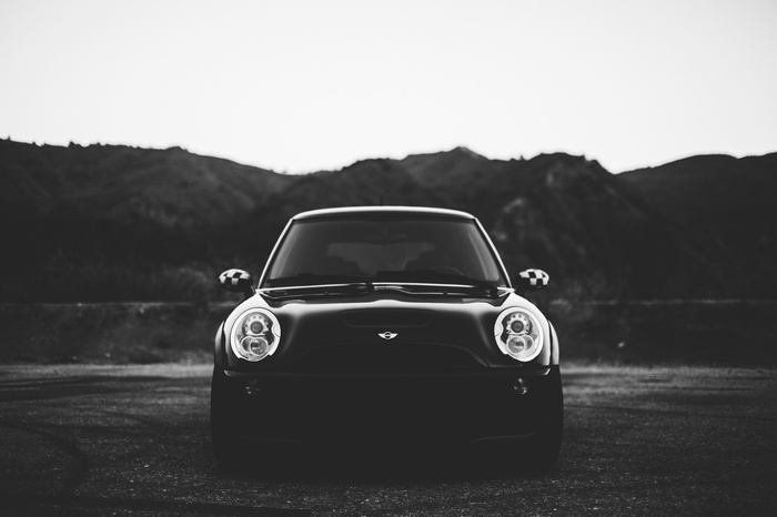 Black Mini Cooper S R56 parked outdoors