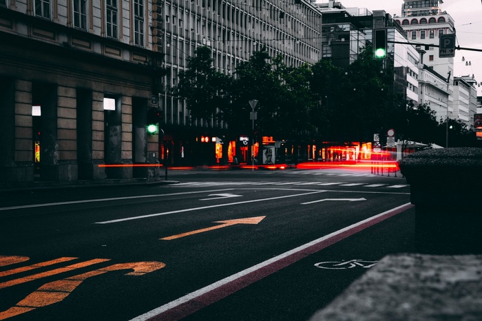 Cityscape with traffic lights and light trails