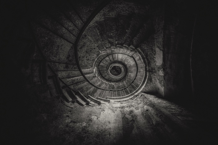Monochrome spiral staircase photography