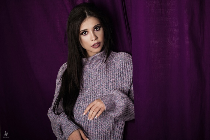 Woman with long hair wearing a sweater