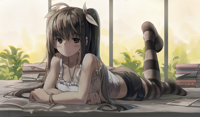 Anime girl with thigh-highs lying on desk with books