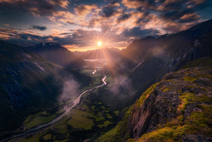 Sunset over a Norwegian valley with a river