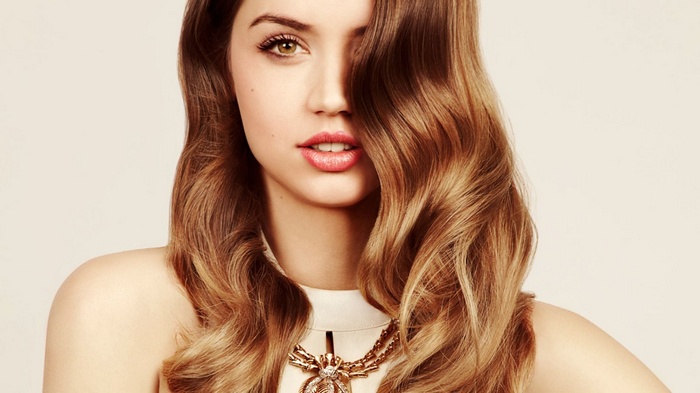 Ana de Armas with long wavy brown hair