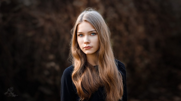 Portrait of Ksenia Malofeeva with blue eyes