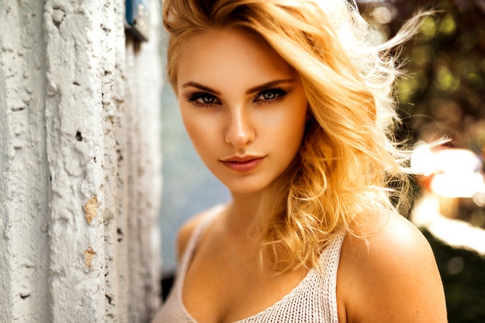 Portrait of a blonde woman by Miro Hofmann
