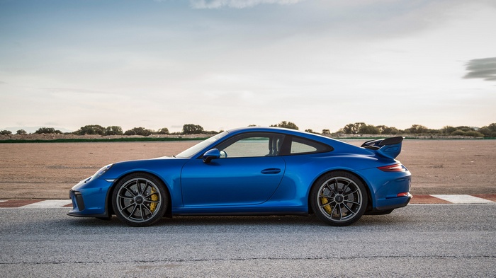 Blue Porsche 911 GT3 on a Racetrack
