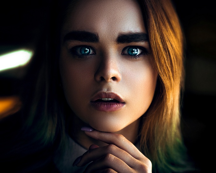 Close-up portrait of a woman with blue eyes