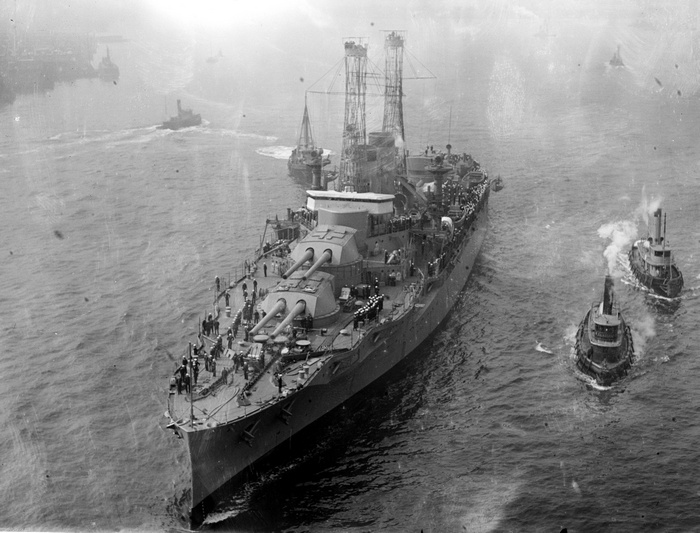 Battleship New York class with tugboats