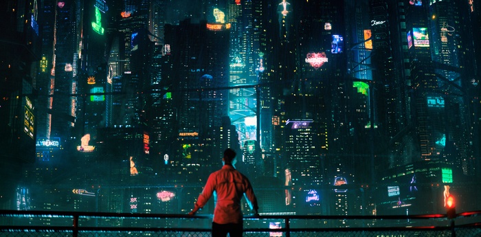 Man overlooking a futuristic cyberpunk city from Altered Carbon