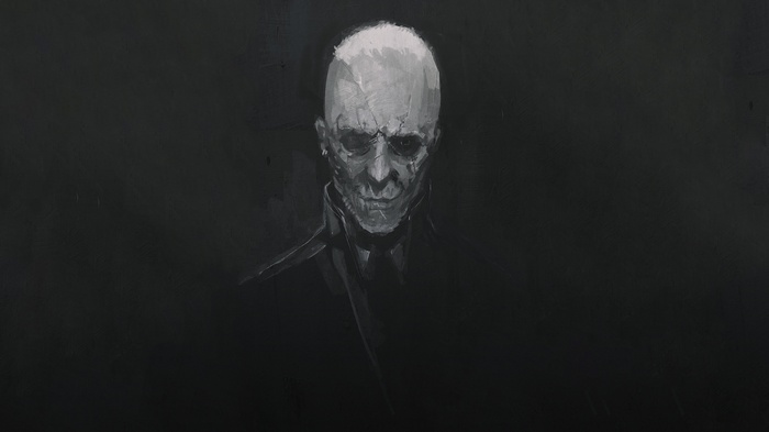 Bald man with scars and black clothing