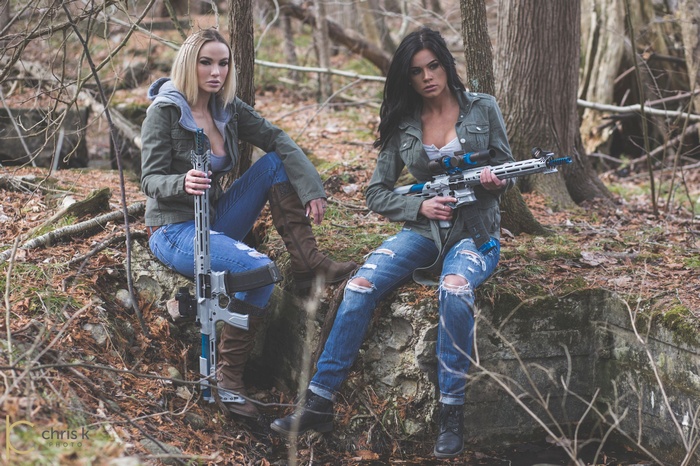 Kimberly Matte and Robyn Croft with AR-15 rifles