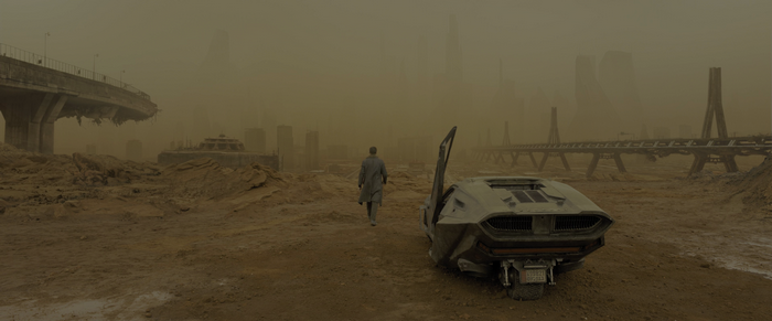 K from Blade Runner 2049 in a desolate city