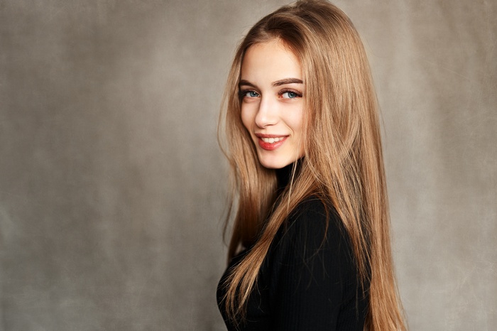 Ivan Losev, blue eyes, looking at viewer, black sweater, straight hair, face, long hair, women, black clothing, portrait, looking over shoulder, simple background, smiling
