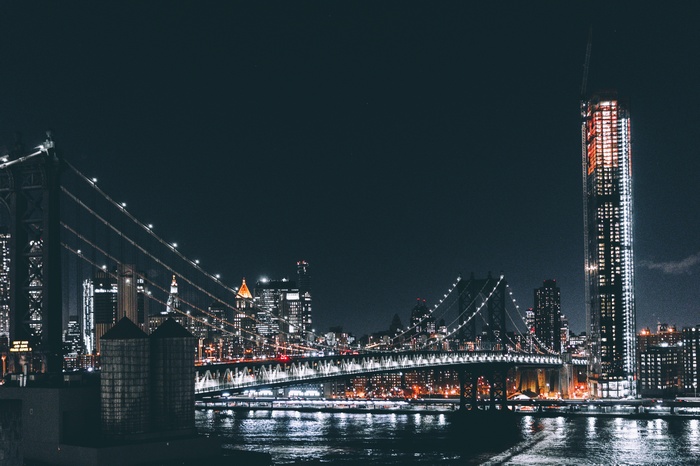 Manhattan Bridge and skyline at night