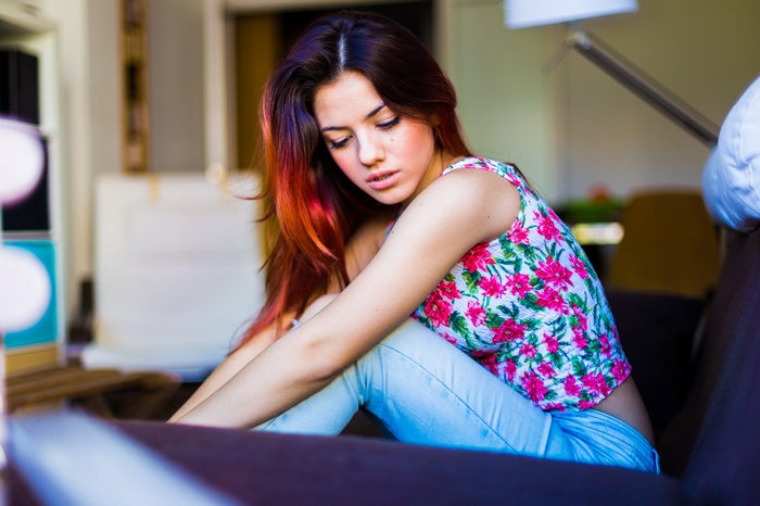 Delaia Gonzalez wearing a floral top and jeans