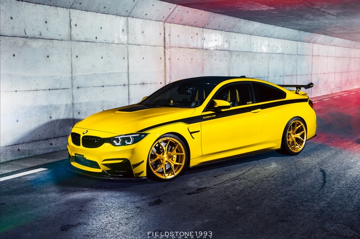 Yellow BMW M4 Coupe with Gold Wheels