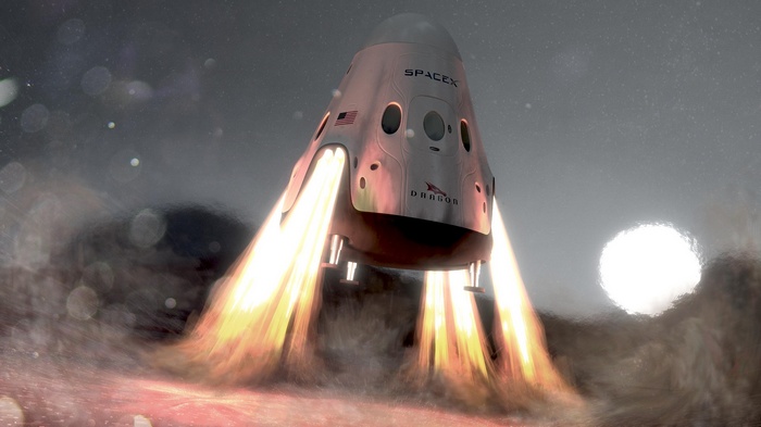SpaceX Dragon spacecraft landing with thrusters firing