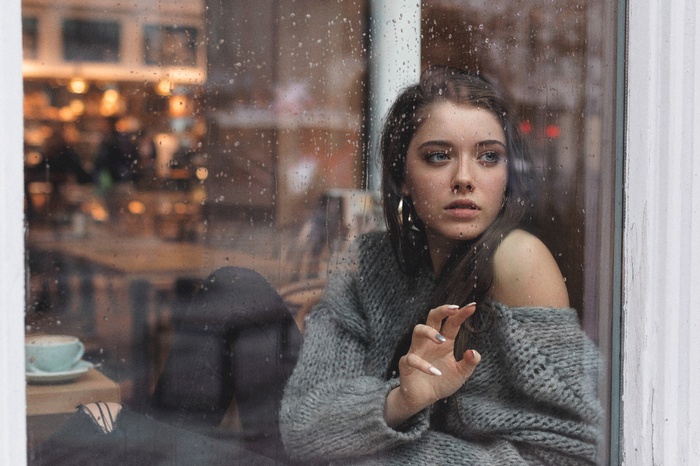 Polish women, torn jeans, looking into the distance, sweater, hoop earrings, portrait, rain, women, long hair, Kuba Brencz, face, brunette, Dagmara Podolak, grey sweater, blue eyes, window