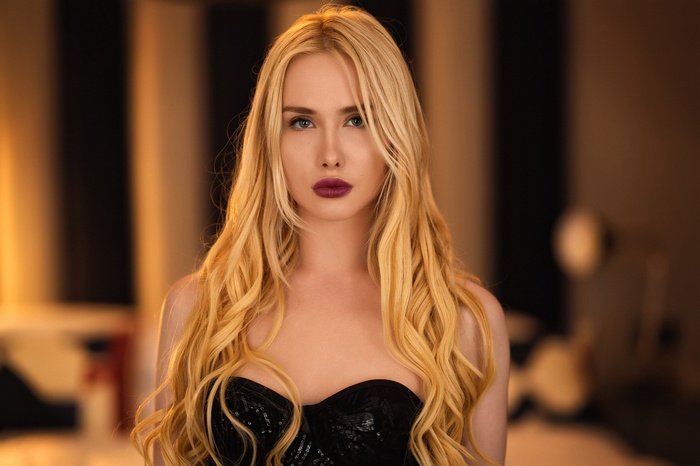 Blonde woman with long wavy hair