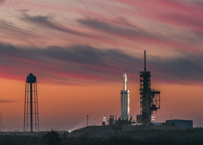 SpaceX Falcon Heavy Rocket on Launch Pad at Sunset