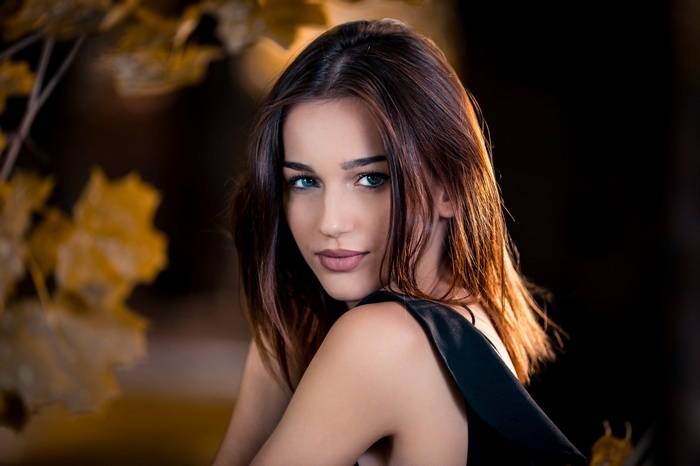 Portrait of a young woman with blue eyes