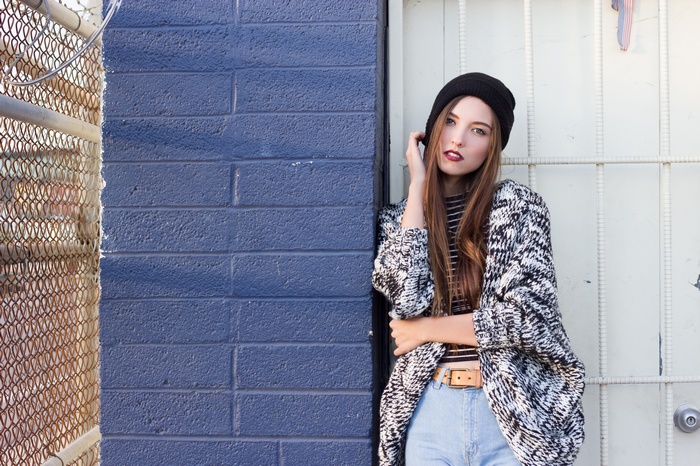 Savvy Taylor wearing a beanie and sweater